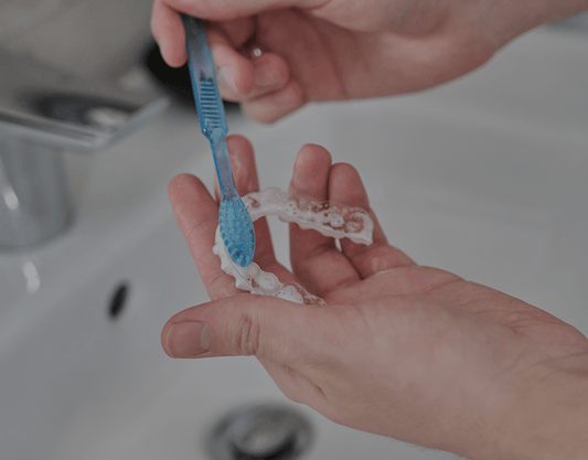 How to Clean Invisalign: Tips, Prevention, and More